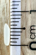 ST25 · Grain beside a ruler