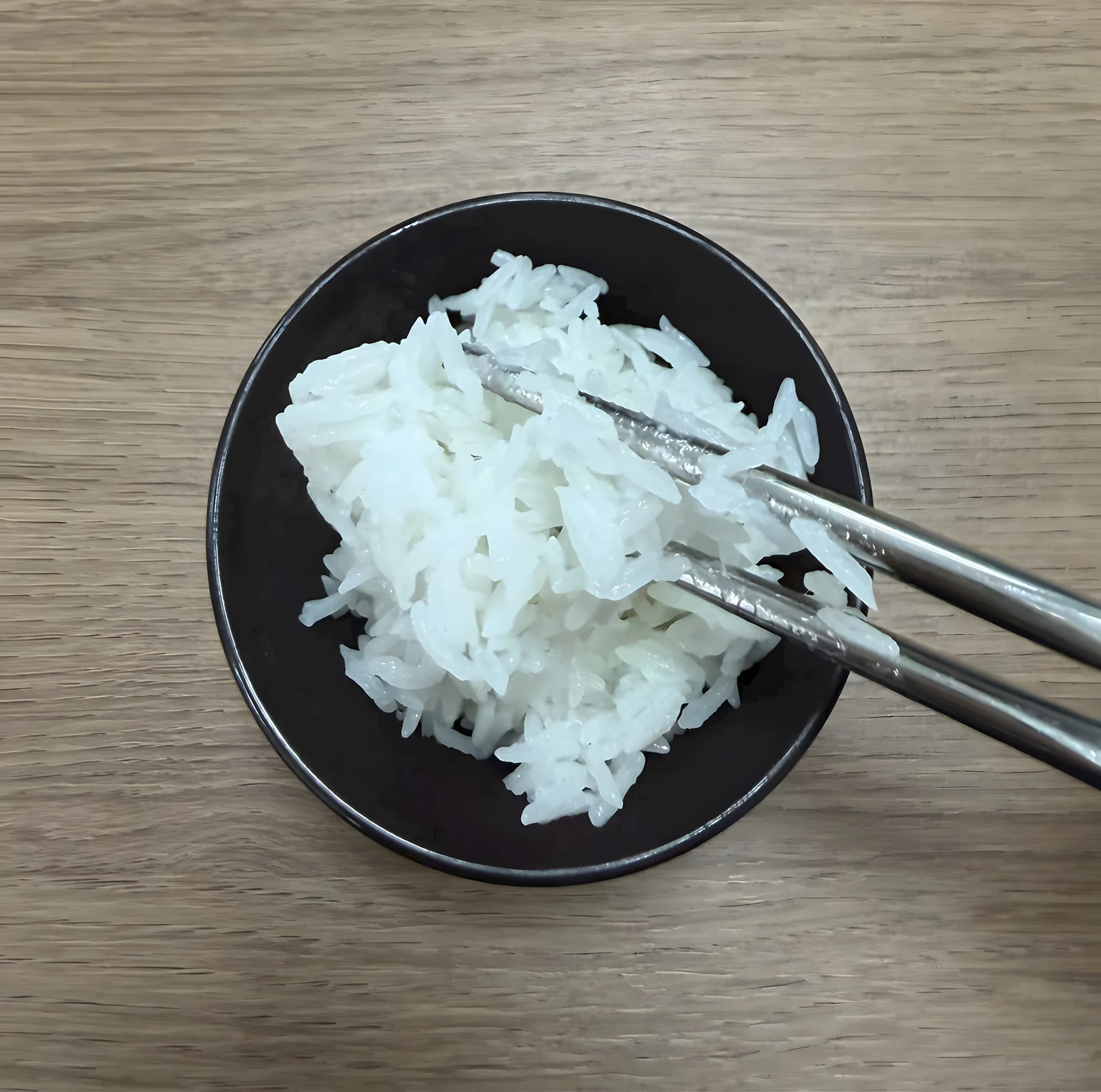A cooked-rice sample from the supplied photo archive. Variety and test conditions should be recorded separately.