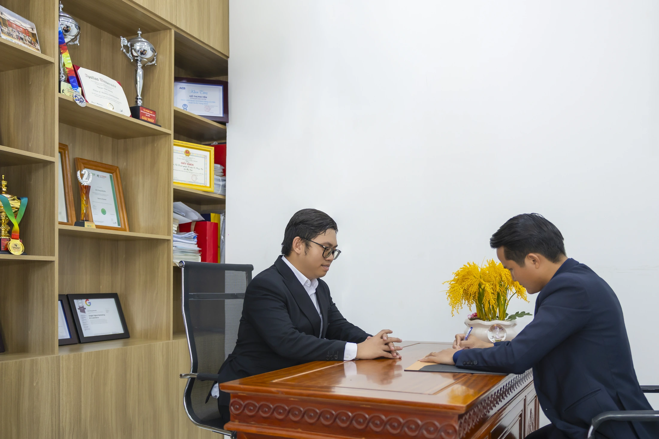 The Vũ Phong Phú team in the company office
