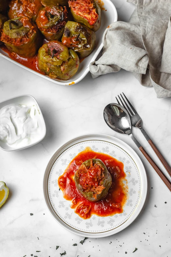 Mediterranean Rice-Stuffed Peppers in Tomato Sauce